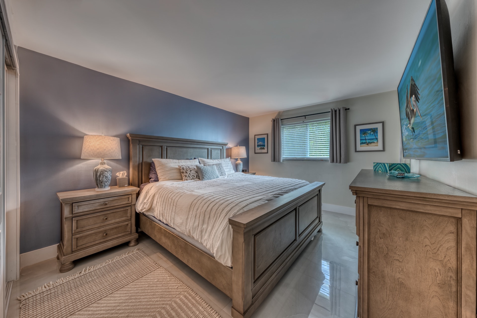 Bedroom with wooden furniture and blue accents