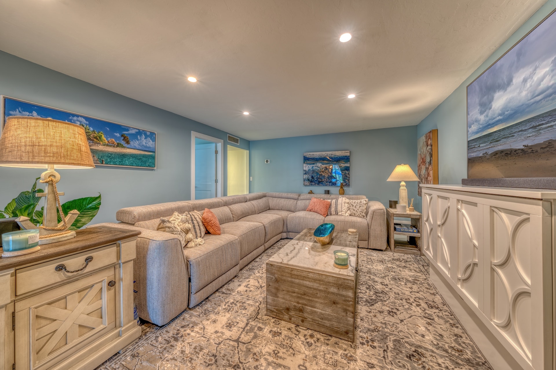 Coastal themed living room with sectional sofa