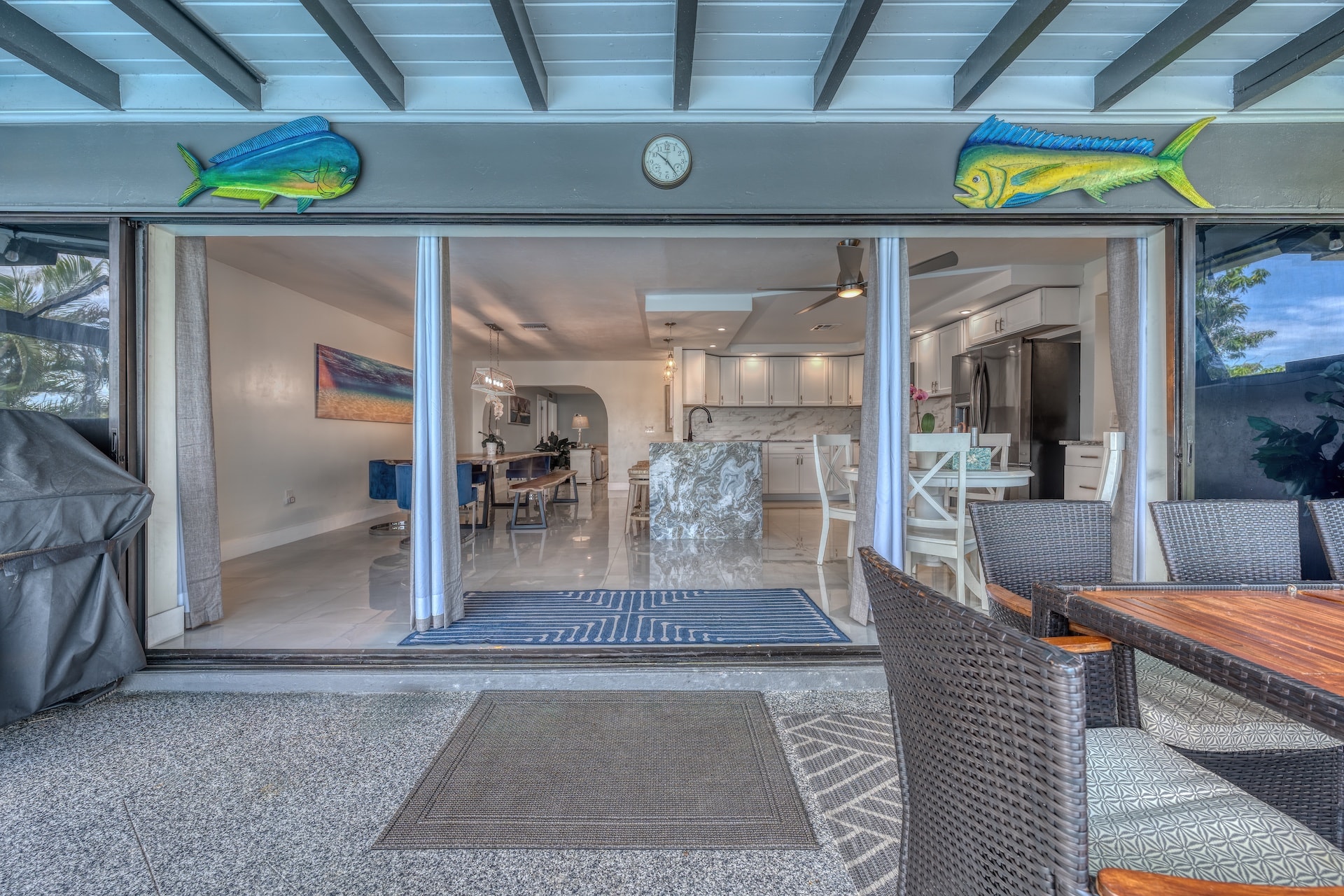 Modern home interior with ocean view patio