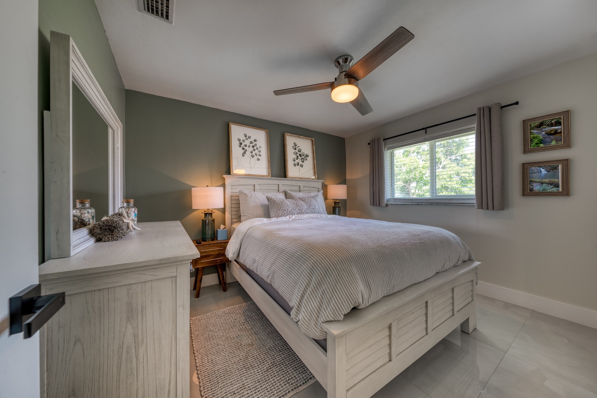 Bedroom with green accent wall