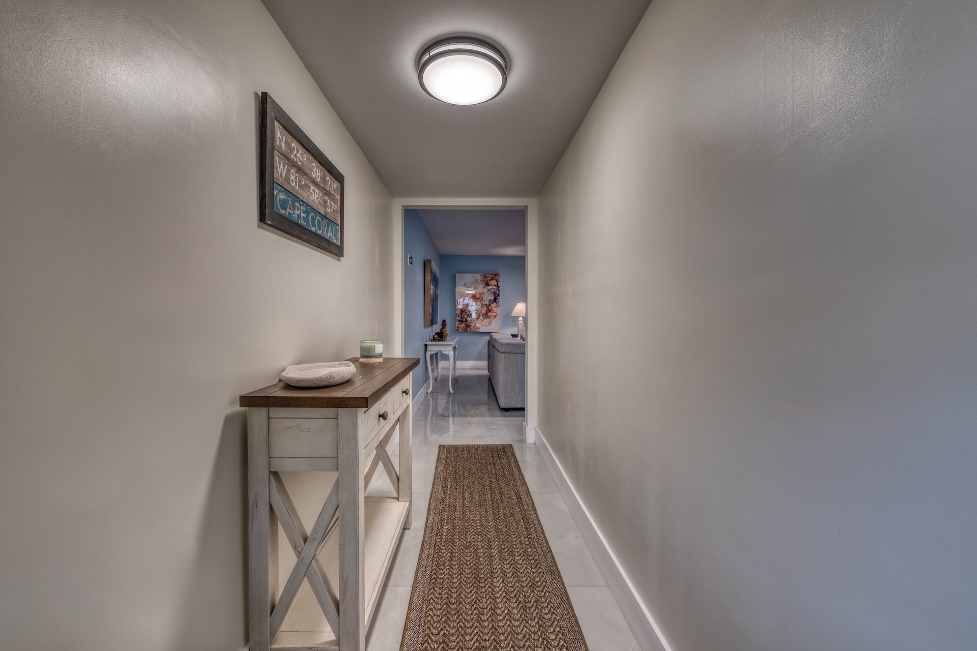 Hallway with console table and runner rug