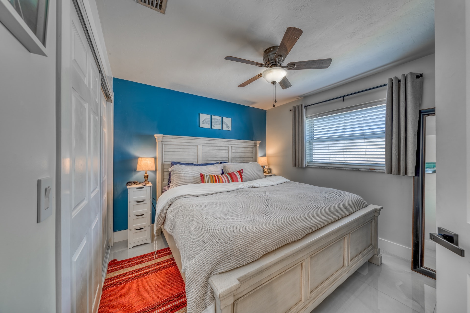 Bedroom with blue accent wall