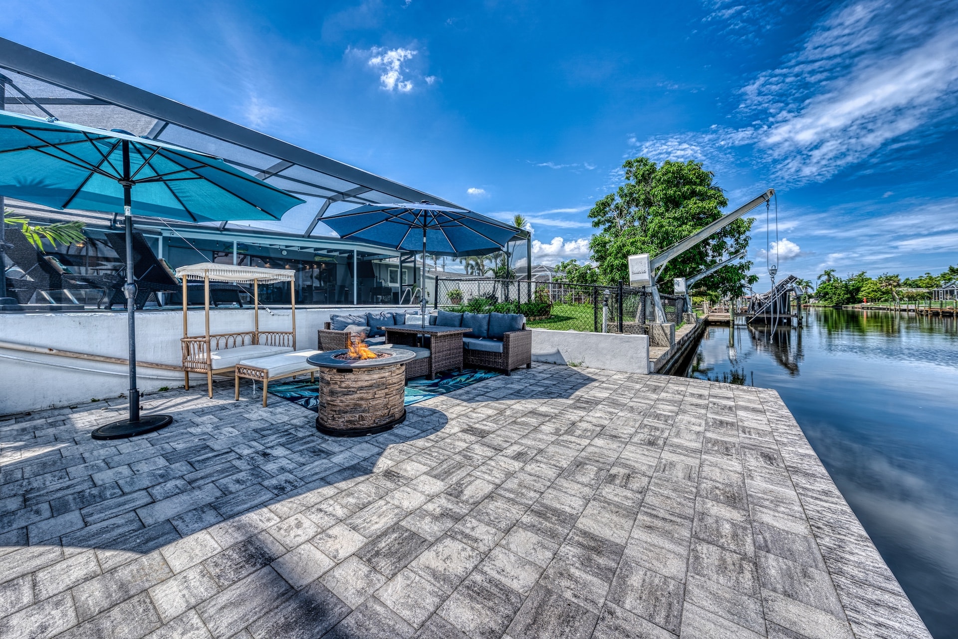 Waterfront patio with fire pit seating
